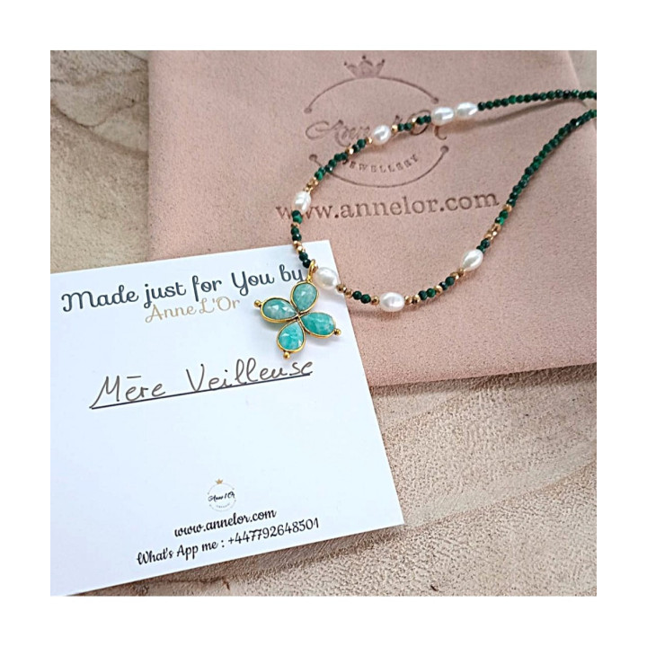 Murmures Precieux® dash and dot jewellery ‘Mère veilleuse’ necklace in machalite semi-precious stone and cultured pearls, hand-thread, with a cross pendant on its pink velvet packaging with jewellery purse