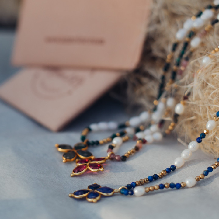 Murmures Precieux® dash and dot jewellery dash and dot jewellery necklaces in semi-precious stone cultured pearls, hand-thread, with a cross pendant with their pink velvet packaging with jewellery purse